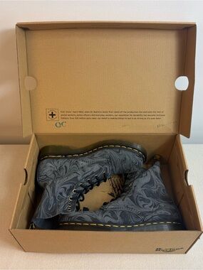 Dr. Martens women’s Pascal Marble-Print 8-Eye Lace-Up Boots in Charcoal